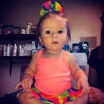 Emmersyn wearing her rainbow skirted bummies for her 1/2 birthday #babiesofinstagram #handmadewithlove #rainbows #smallshoplove